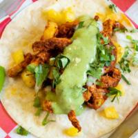 Al Pastor Taco · Guajillo Chile Marinade Pork with Grill Pineapple and Avocado Sauce.