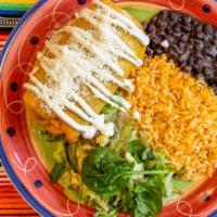 Chimichangas · Chicken, Beef or Pork. Served with Rice, Beans, Cream and Guacamole.