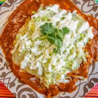 Enchiladas · Three Corn Tortillas Filled with Chicken, Pork or Beef, Red, Green Salsa or Mole Sauce. Serv...