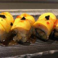 Mido Dragon Roll · Shrimp tempura & avocado
Top with lobster salad, mango
& black tobiko, Mango chili sauce