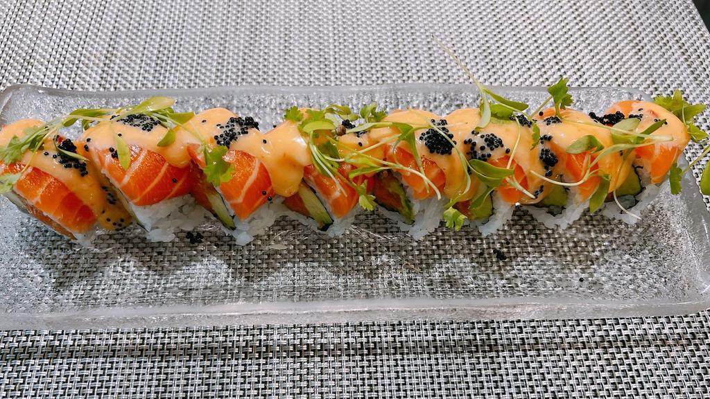 Salmon Lover Roll · Crunchy spicy salmon & avocado , top with fresh salmon and micro cilantro , tobiko and sweet chill mayo.