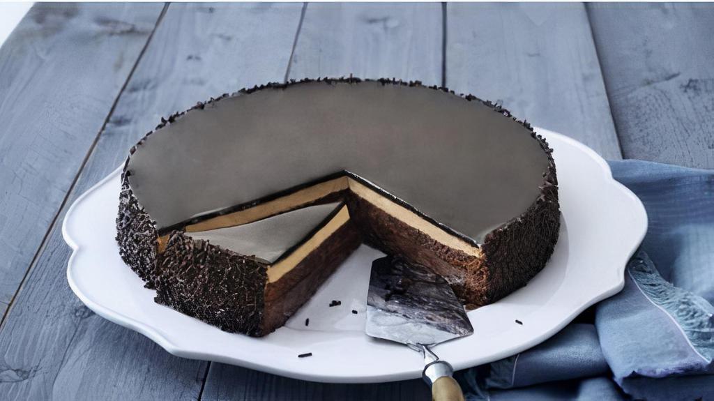 Chocolate Temptation · Layer of chocolate cake made with cocoa from Ecuador , filled with chocolate and hazelnut creams and a hazelnut crunch , cover with a chocolate glaze