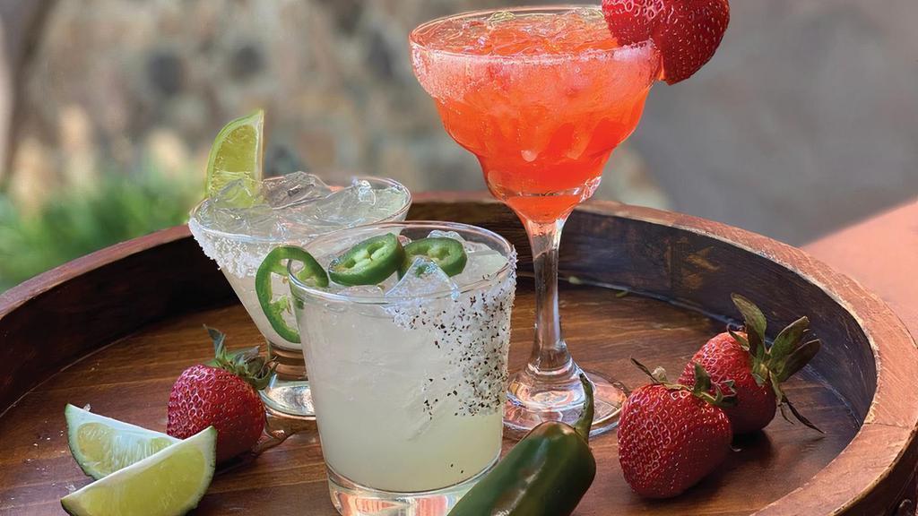Julio'S Margarita *Requires Food Purchase · All the joys of drinking your favorite Uncle Julio's Margarita from the comfort of your own home. Choose from Classic Julio's Margarita mix, Strawberry, or Spicy.