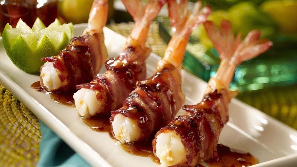  Honey Habanero Shrimp Appetizer · Sweet and Fiery. Four mesquite-grilled jumbo shrimp stuffed with fresh minced habanero and . crumbled queso fresco, wrapped in smoked bacon and topped with the honey chipotle glaze.