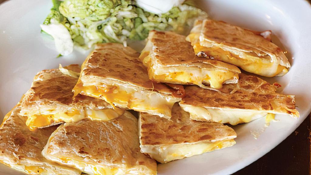 3 Cheese Quesadilla · Monterrey jack, cheddar and American cheese on flour tortillas with sour cream and fresh guacamole.