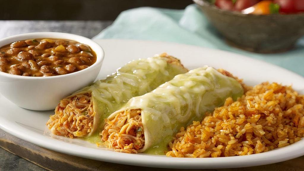 Chicken Enchiladas · Choose between two or three chicken enchiladas with creamy hatch chili sauce. Served with Mexican rice and frijoles a la charra.