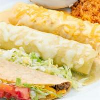 Tex-Mex Combination Dinner · Beef enchilada with agave queso sauce,. chicken enchilada with creamy hatch chile. sauce and...
