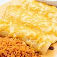 Beef Enchiladas · Choose two or three ground beef enchiladas with agave queso sauce. Served with Mexican rice ...