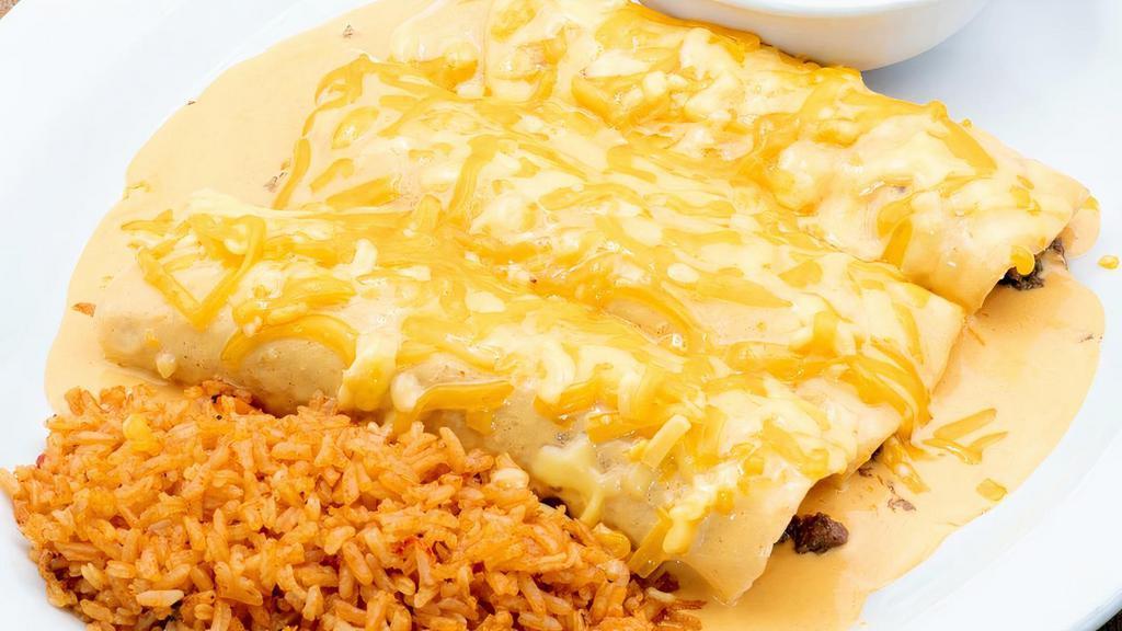 Beef Enchiladas · Choose two or three ground beef enchiladas with agave queso sauce. Served with Mexican rice and frijoles a la charra.