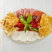 Antipasto #2 · Fresh Mozzarella cheese, roasted red peppers, pepperoni, salami, and olives. Served with gar...