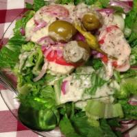 Dinner Salad · Romaine lettuce, tomatoes, cucumbers, red onions, Sicilian green olives, and pepperoncini.