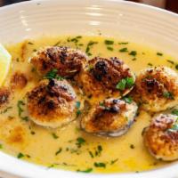 Baked Clams · Fresh littleneck clams baked with our seasoned breadcrumb and clam broth.