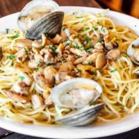 Linguine White Clam Sauce · Chopped little neck clams cooked in white sauce (garlic, olive oil, fresh herbs and clam bro...