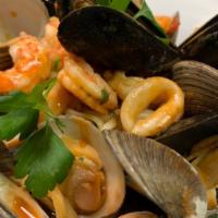 Linguine Pescatore · Our Linguine with sautéed shrimps, calamari, clams & mussels and our plum tomato sauce