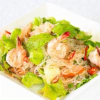 Glass Noodle Salad (Yum Woon Sen) · Long rice tossed with tomatoes, onions, cucumbers, mint leaves, romaine lettuce, fresh spice...