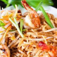 Rice Noodles With Bean Sprouts (Pad Thai) · Thai rice noodles prepared in sizzling hot wok with tofu, egg, bean sprouts, and chives. Ser...