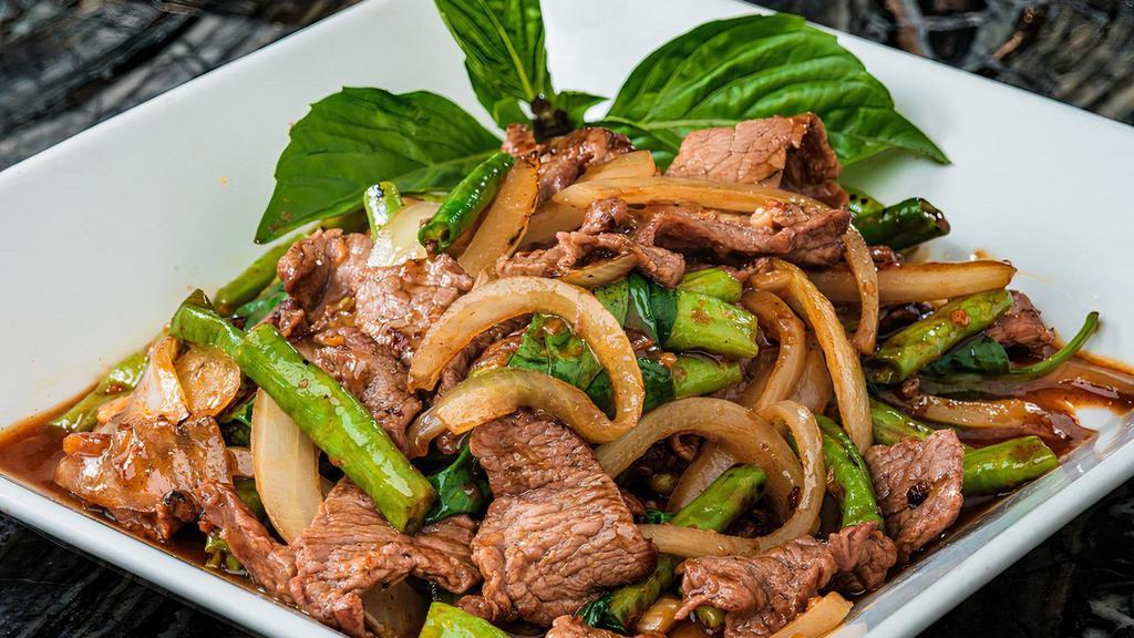 Sizzling Basil (Pad Horapa) Medium Spice · Stir fried in a sizzling wok with long beans, onions and sweet basil served in a chili sauce. (medium spice)