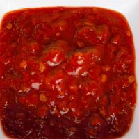 Side Sambal Chili Sauce · 2 oz portion. Add to any dish for your desired spice level.