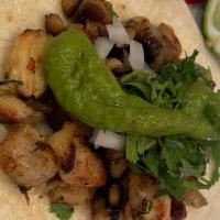 Pollo Asado Taco  · Chicken Corn Tortilla, Guacamole, Cilantro, Onion, Side Of Radish, And Lime