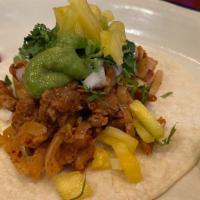 Al Pastor Taco  · Spicy Pork With Pineapple, Corn Tortilla, Guacamole Cilantro, Onion, Side of Radish And Lime