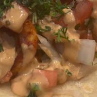 Shrimp Taco  · Shrimp, Corn Tortilla, Guacamole, Cilantro, Onion, Side Of Radish, And Lime