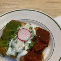 Flautas De Queso · 3 Mexican rolled Tortilla fried 
topped with sour cream, cotija cheese served with rice and ...