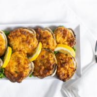Baked Stuffed Clams · Creamy blend of clams, veggies, bacon, and cheese.