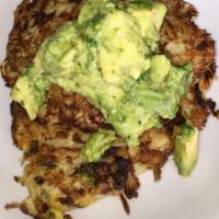 Vegan Mexican Latkes (Avocado, Onions & Cilantro) (1) · Shredded potatoes with cilantro, roasted corn and onions, topped with avocado hummus, choppe...