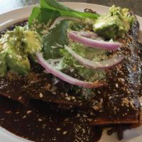 Chicken Mole Enchilada, Red Onions, Avocado & Cotija Cheese (1) · 3 pieces corn tortillas stuffed with chicken mole toppings of avocado, red onions and cotija...