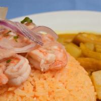 Guatita Con Camarones · Beef tripe and shrimps with rice and sweet plantains.