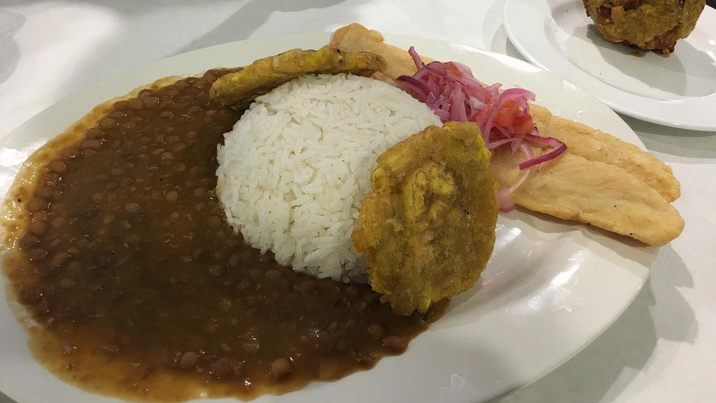 Arroz Marinero · Seafood mixed rice w/ sweet plantain.