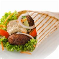 Hummus Wrap · Hummus with lettuce, tomatoes, cucumber, hot and white sauce.