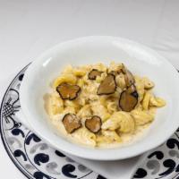 Pasta Tartufata · Vesuvio pasta, black truffle, parmesan