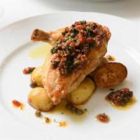 Pollo Al' Limone · Roasted organic chicken breast, capers, and lemon sauce.