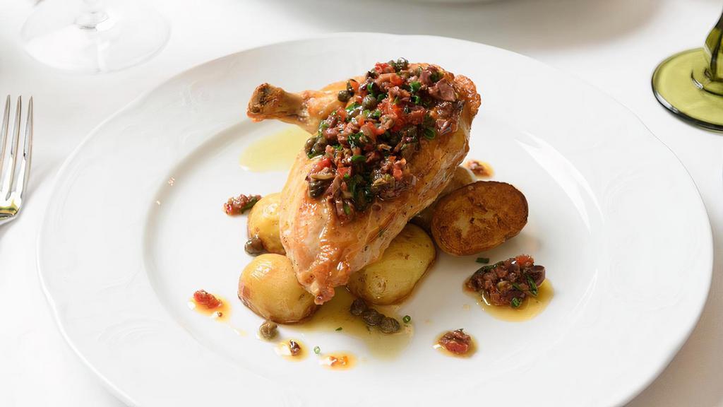 Pollo Al' Limone · Roasted organic chicken breast, capers, and lemon sauce.