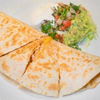 Quesadilla · Delicious flour tortilla filled with melted cheese with your choice of meat.