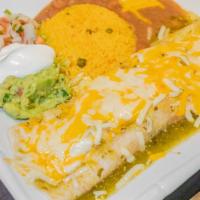 Burritos · Flour tortilla topped with house sauce and melted cheese stuffed with your choice of meat.