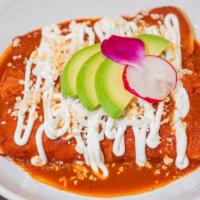 Enchiladas · Delicious corn tortillas smothered in a delicious red or green Mexican sauce and stuffed wit...