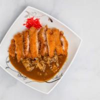 Chicken Katsu Curry Rice · Breaded fried chicken with curry sauce.
