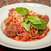 Spaghetti And Meatballs · Whole wheat Spaghetti served in our house made tomato sauce  topped with Vegan Meatballs and...