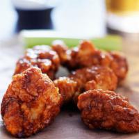 Bbq Boneless Wings · Crispy tender deep-fried tenders tossed in BBQ sauce made to perfection.