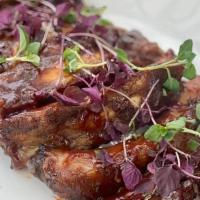 Half Rack Organic Berkshire Pork Baby Back Ribs (Gf) · Half a rack of succulents baby back ribs seasoned with our Aussie BBQ spices and finished wi...