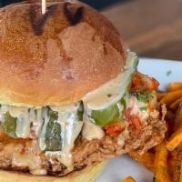 The Tk Fried Chicken Burger **New** · Mennela's chicken breast, dredged in our flour blend and fried to crispy perfection and fini...