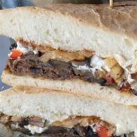Ned Kelly · Pastured, smokey, Philly style steak, sautéed Portobello, red bell pepper and caramelized ci...