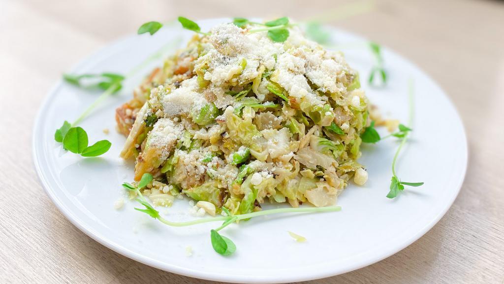 Roasted Brussel Sprout Salad · Raw and warm roasted Brussels sprouts, focaccia croutons, parmesan cheese, Caesar dressing