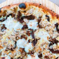 Truffle & Porcini Pizza · Local fresh and aged mozzarellas, Urbani porcini mushrooms, Bulich Farm white mushrooms, tru...