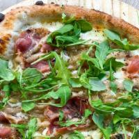 Preserved Fig, Pancetta, And Blue Cheese Pizza · Aged local mozzarella and blue cheese topped with crispy pancetta, caramelized onions, fresh...