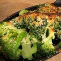 Roasted Broccoli In Parmesan, Garlic, & Lemon · California broccoli, roasted with Parmesan cheese, fresh garlic, lemon, extra virgin olive o...