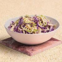 Cabbage Slaw · Chopped cabbage tossed with tahini.