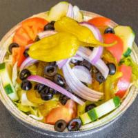 La Nonna'S House Salad · Crisp iceberg lettuce, tomatoes, cucumbers, olives, pepperoncini, sweet red peppers, and red...